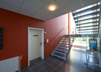 Indendørs arkitektur med trappe – Hansson & Knudsen